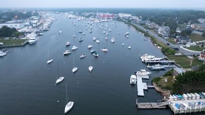 Aerial view of ferries leaving the dock near Falmouth Tides