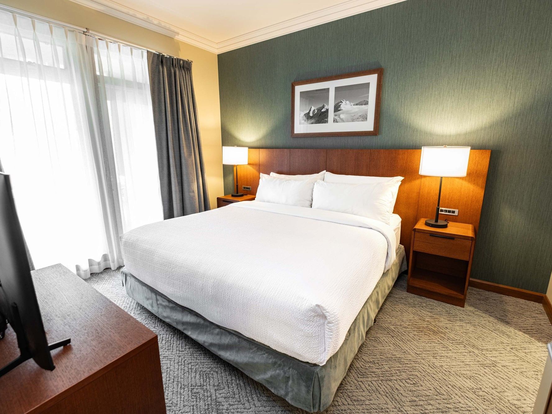 Two Bedroom Suite with two king beds and a sofa bed at The Sutton Place Hotel Revelstoke Mountain Resort in Revelstoke.