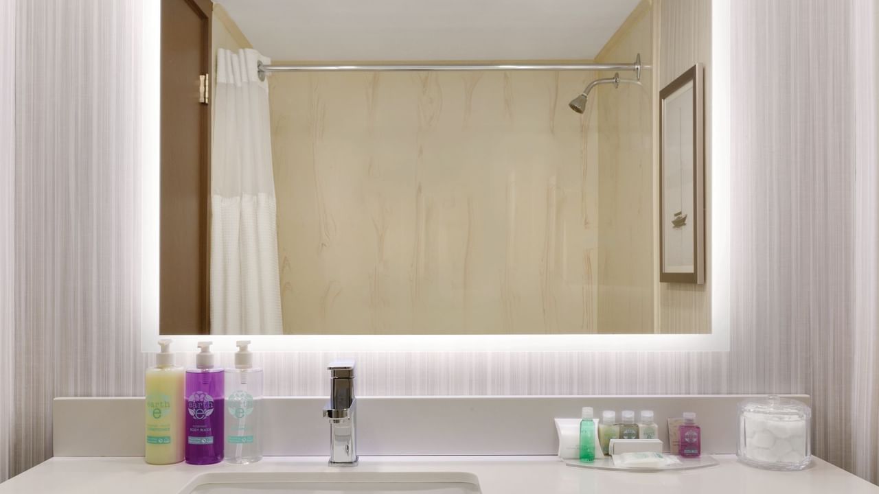 Sink and mirror in hotel bathroom