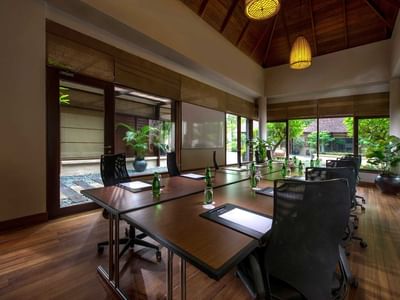 Conference table arranged in a Meeting Room at The Banjaran Hotsprings Retreat