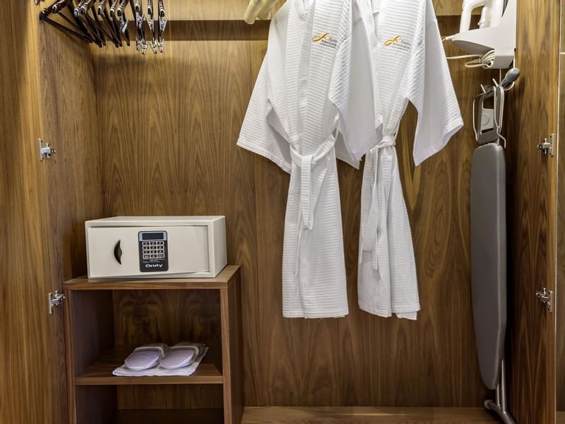 Closet with amenities in Deluxe Room at FA Hotels & Resorts