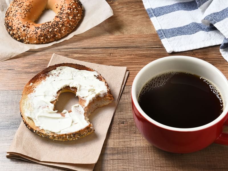 bagel with cream cheese and coffee