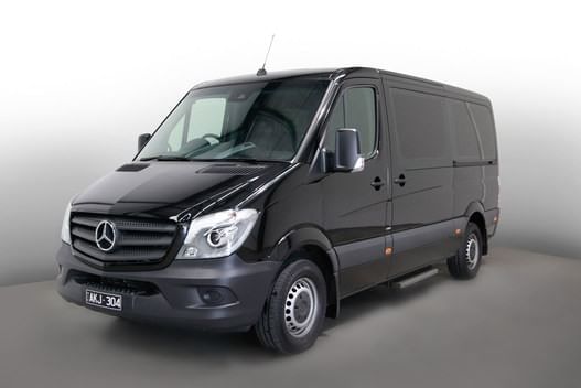 Exterior view of the twelve-seater van at Crown Hotels