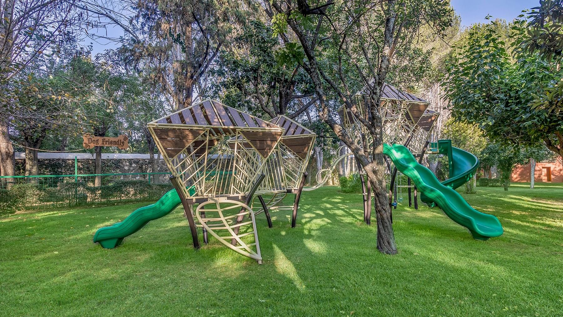 Outdoor play area with slides at Fiesta Americana Hacienda
