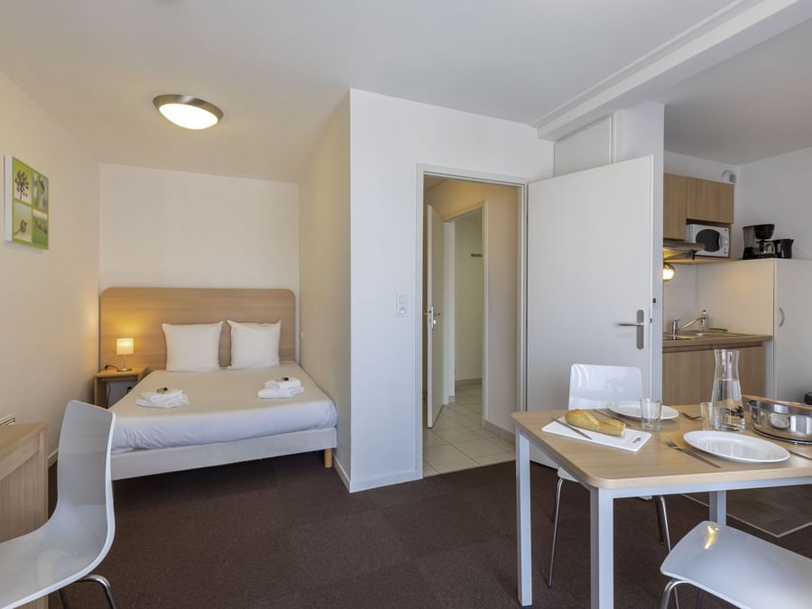 Bed & furniture in Kosy Appart'Hotels Troyes City & Park