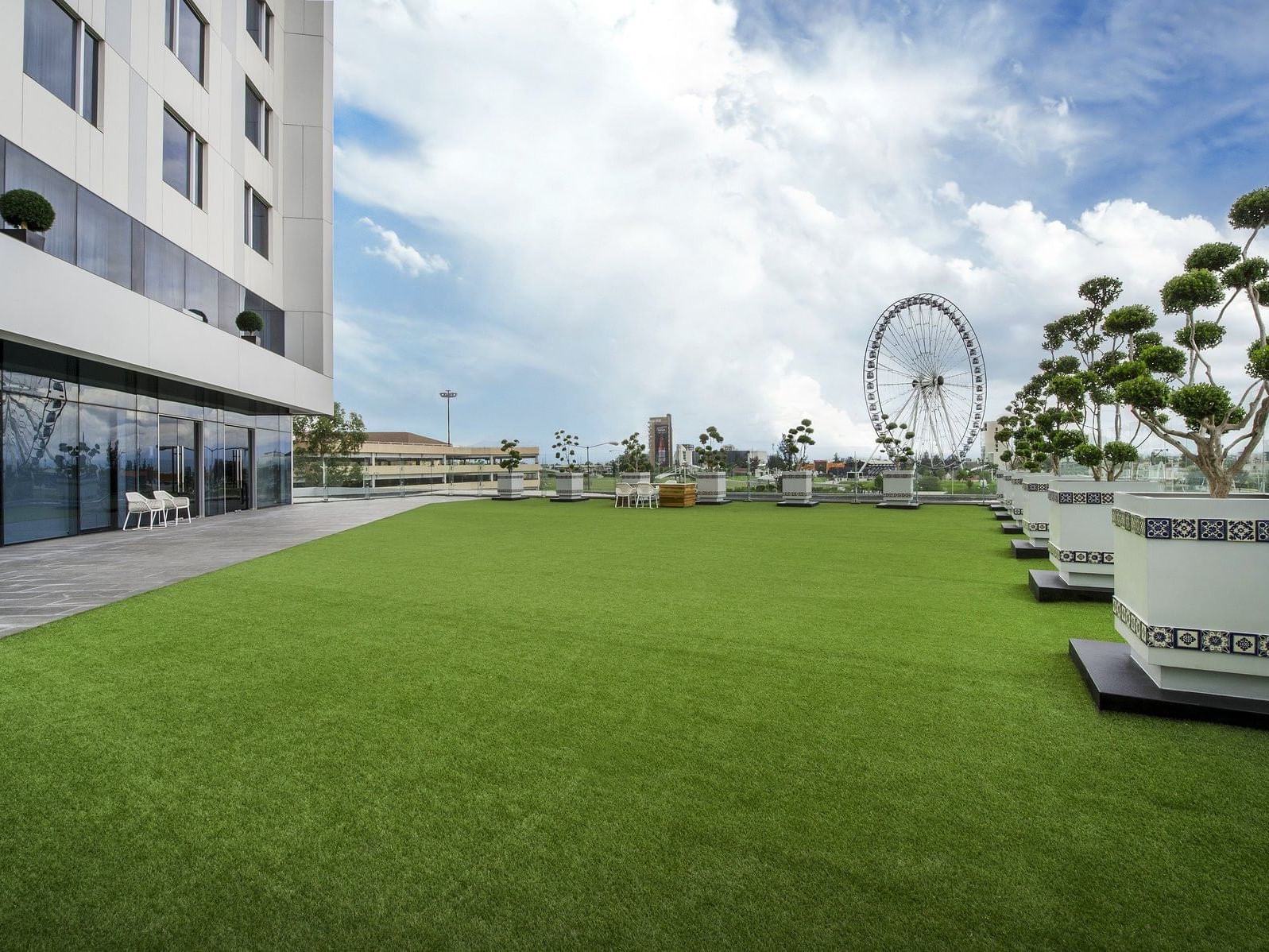 Landscape view of the courtyard lounge area at Fiesta Inn