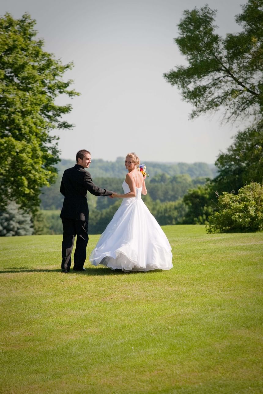 Wedding couple on the grounds of Evergreen Resort