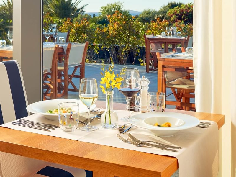 Served meal & wine on a restaurant table, Falkensteiner Hotels