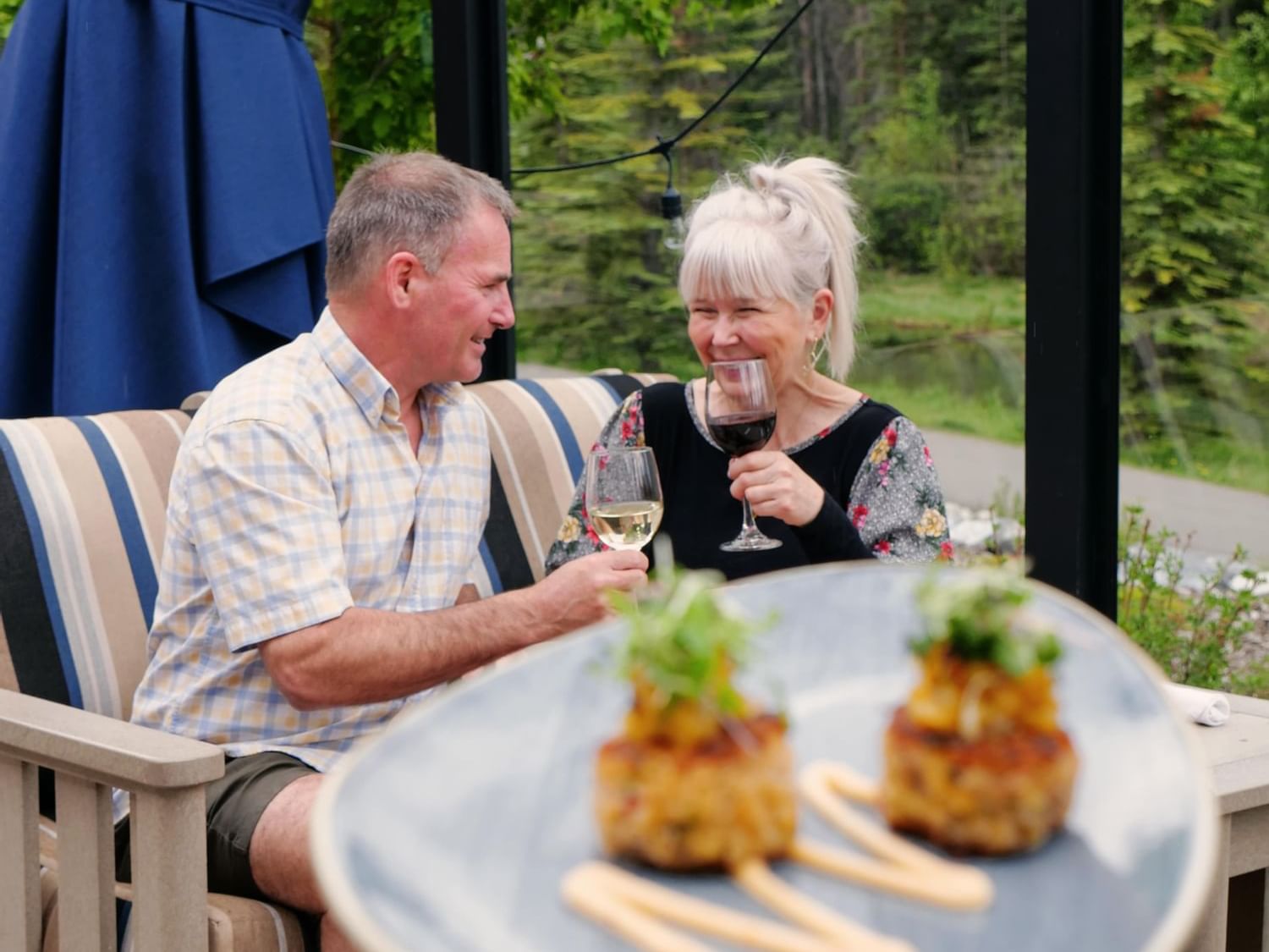 Creekside Patio Couple - The Malcolm Hotel