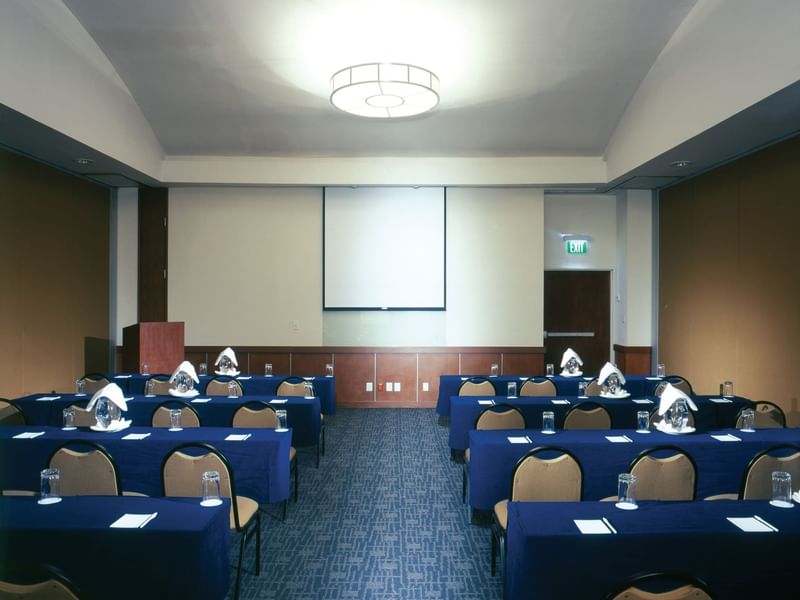 Classroom table setup in Salon E room at Fiesta Inn Hotels