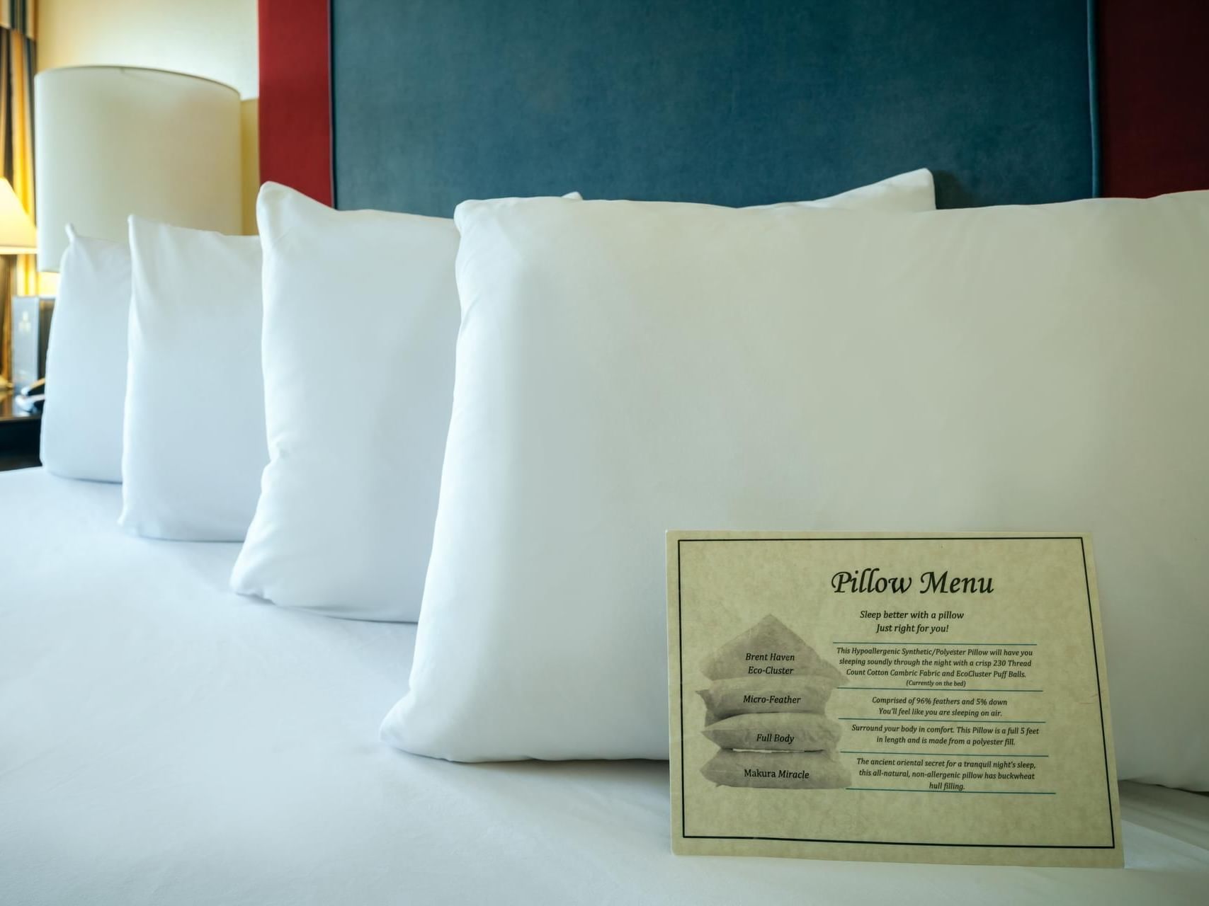 Close-up of pillows in Studio Queen room of Plaza Inn & Suites at Ashland Creek​