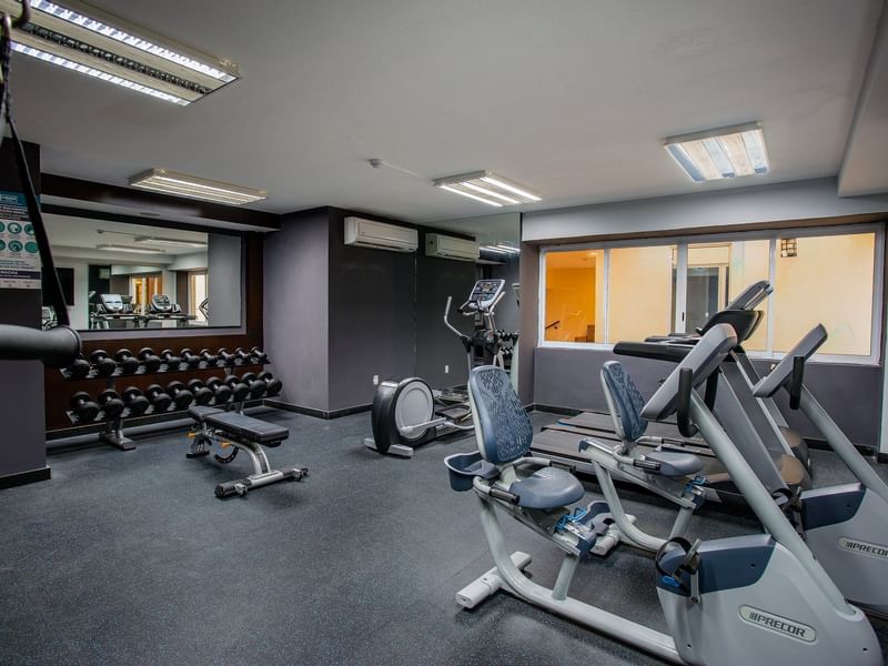 Interior view of the fitness center at Gamma Hotels
