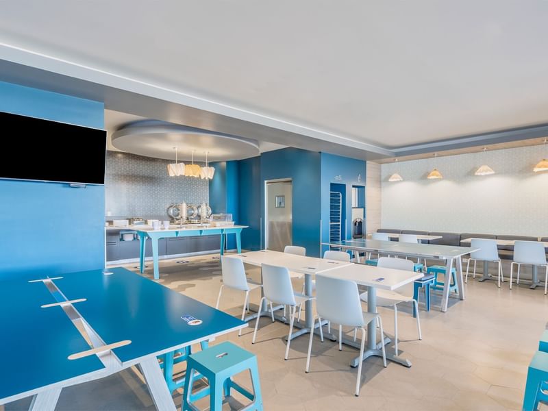 Interior of a dinning area in Breakfast Room at One Hotels