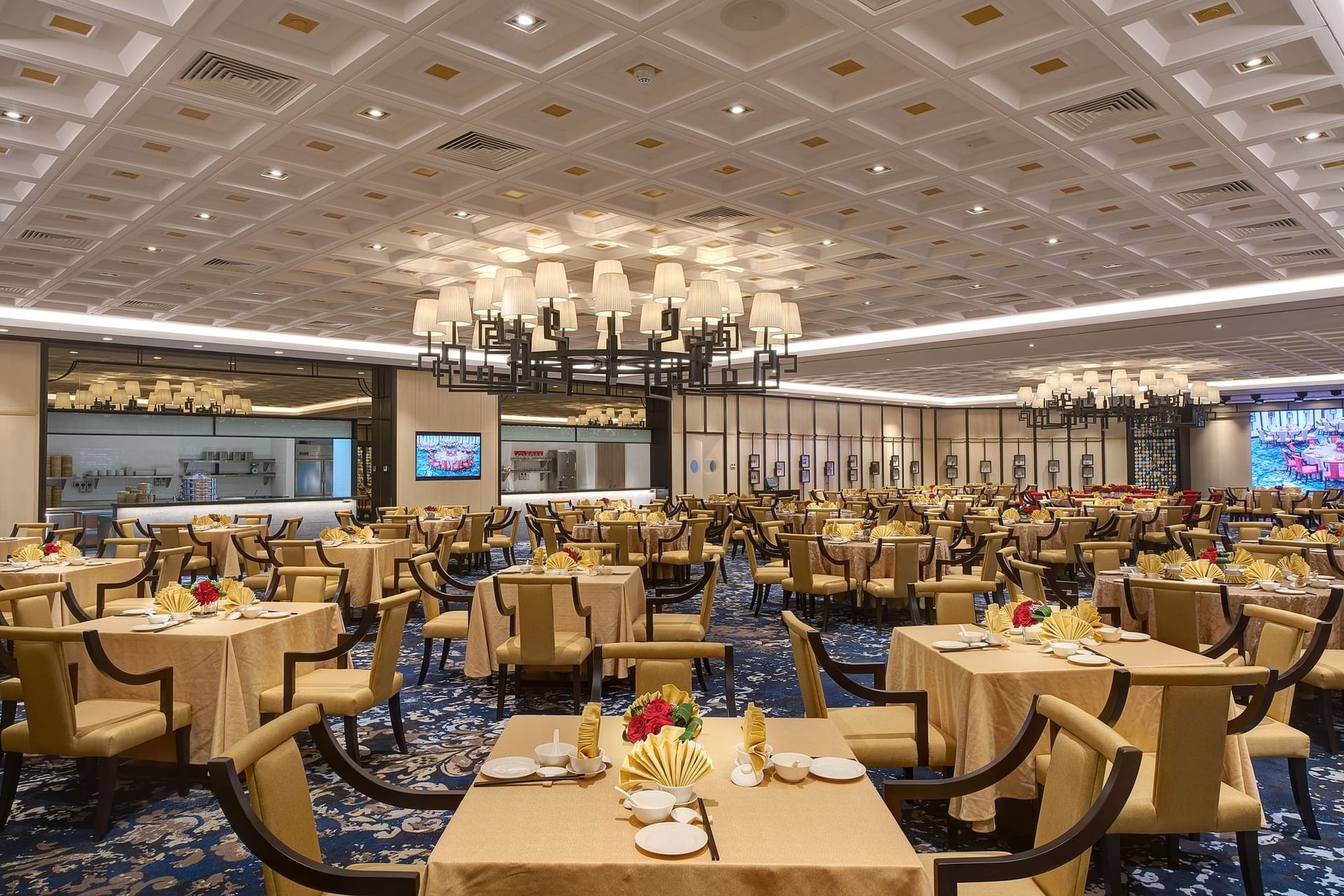 Luxurious and expansive dining hall at One World Hotel, set with numerous tables for a large event