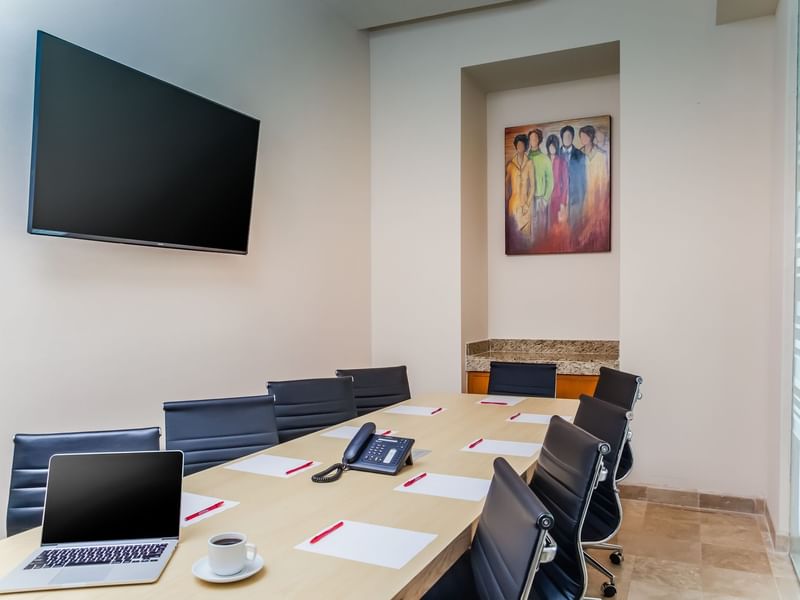 Conference table setup in an event room at Fiesta Inn Hotels