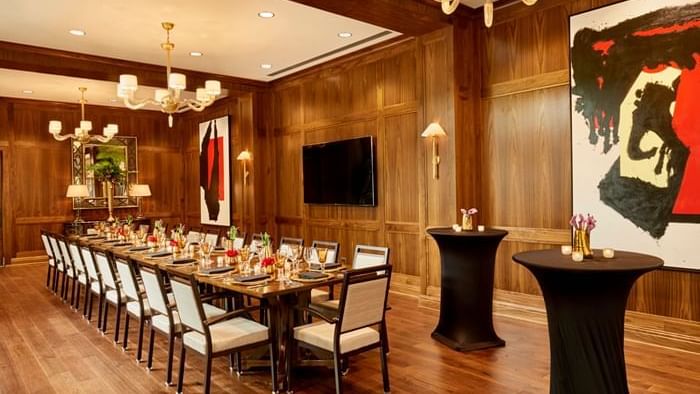 Pod tables by a meeting table, Clancy Room, Townsend Hotel