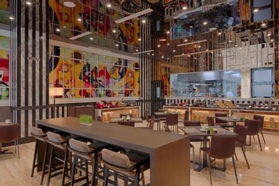le cafe restaurant interior with square wood tables and long tab
