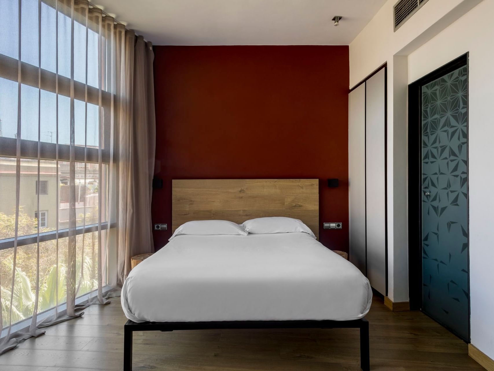 Bedroom arrangement in a room at Aparthotel Allada