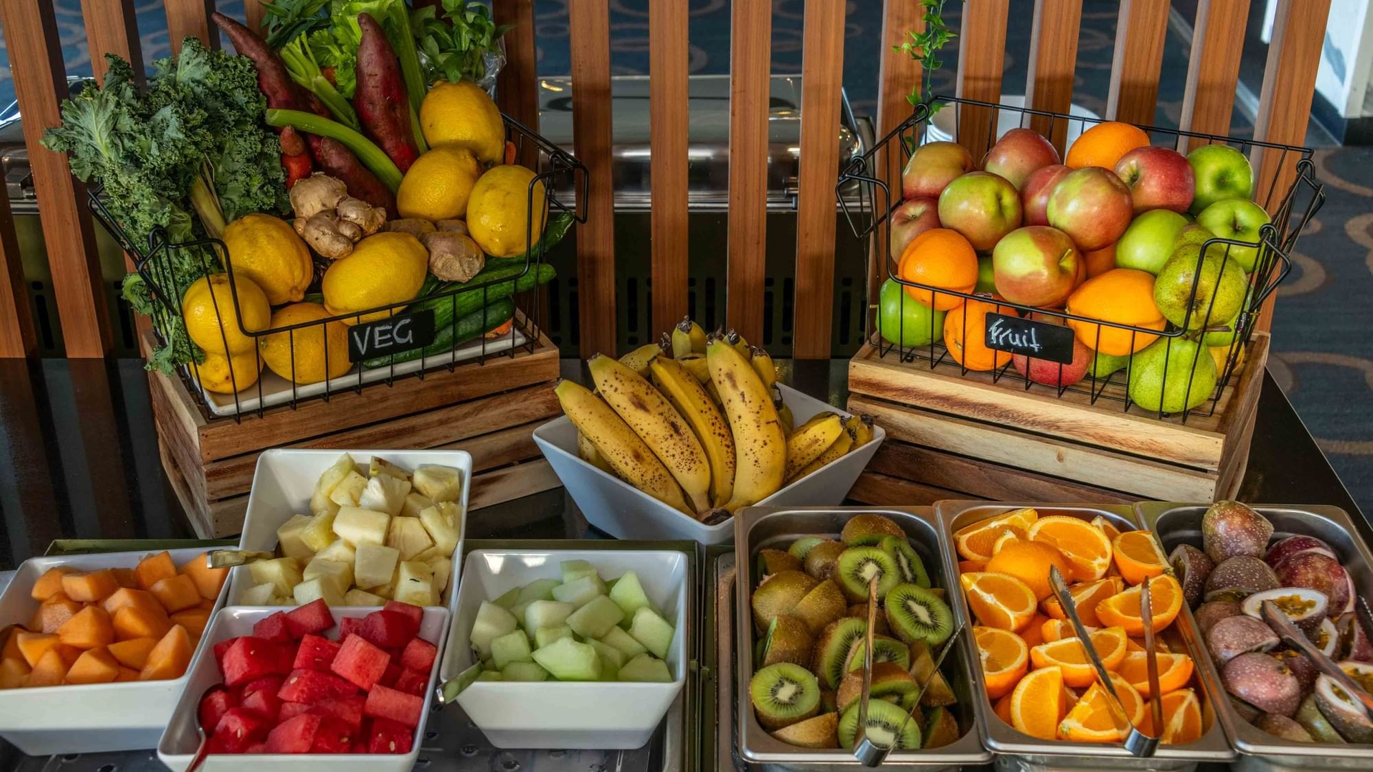 Assorted fresh fruits and vegetables on Buffet Breakfast in baskets and trays at Mercure Kooindah Waters
