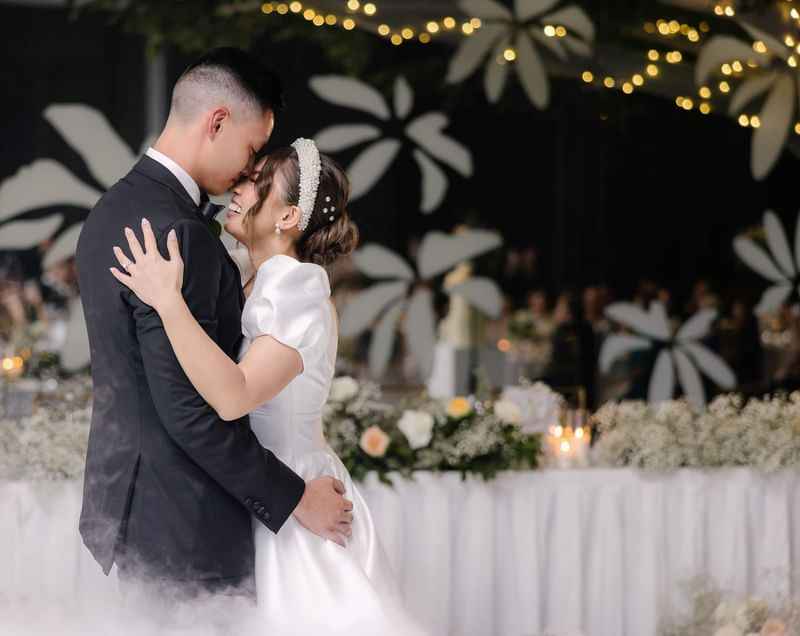 Wedded couple by dancing hall at Emporium Hotel South Bank