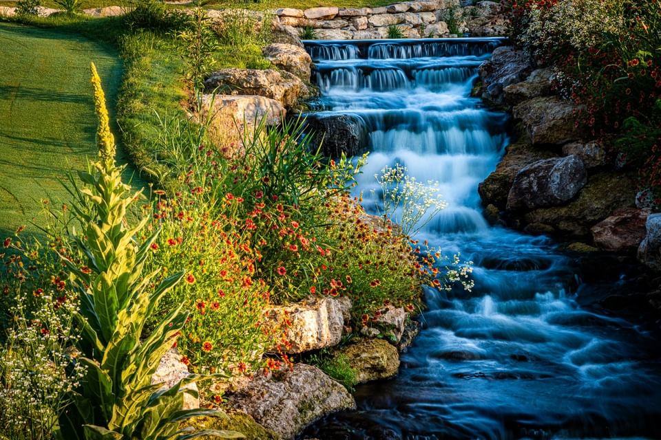 A mini water fall by the golf course near Shangri-La Monkey Island