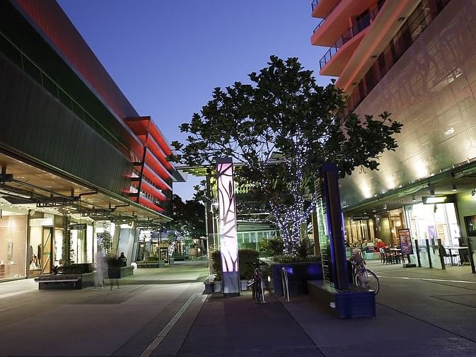 Illuminated Portside Wharf is one of the places to visit in Brisbane with restaurants and cafes near Alcyone Hotel Residences