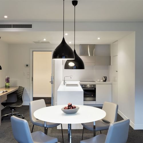 1 Bedroom Apartment kitchen & dining area at Como Melbourne