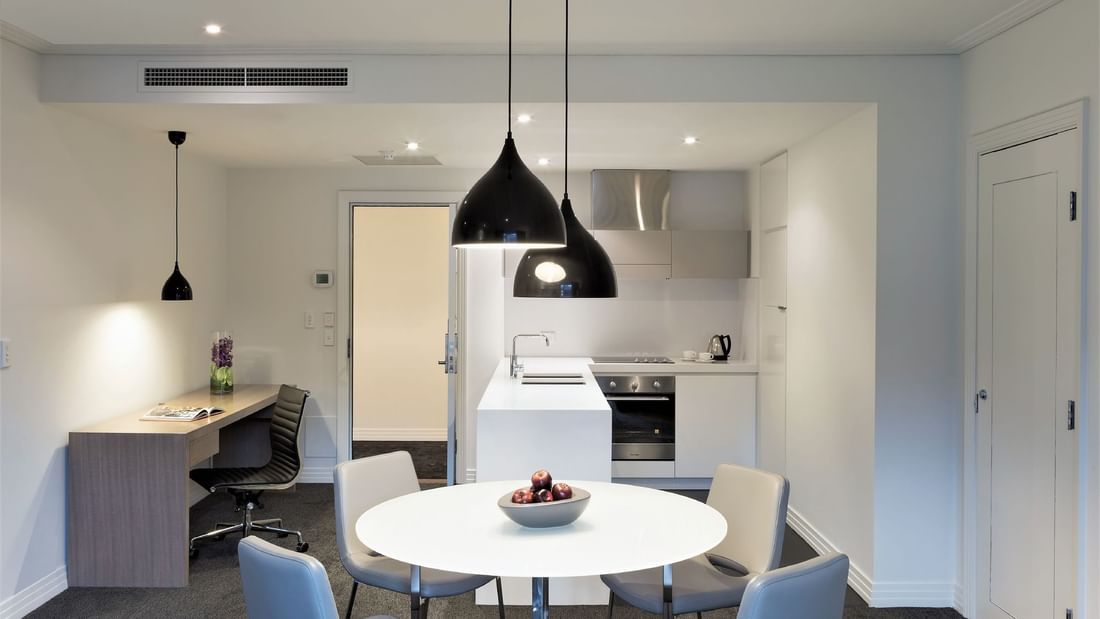 1 Bedroom Apartment kitchen & dining area at Como Melbourne