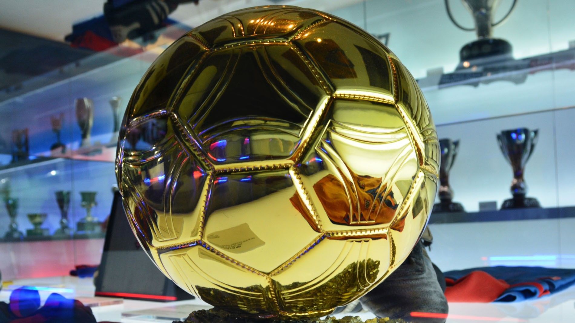 Shiny gold soccer ball trophy in Museo Interactivo del Fútbol near Camino Real Pachuca