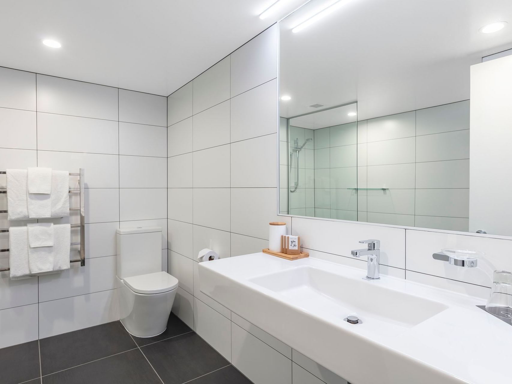 Bathroom lavatory & vanity area in Premium Room at James Cook Grand Chancellor