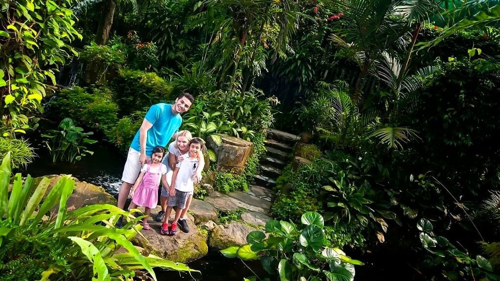A family posing at Butterfly Park near Sunway Resort Hotel