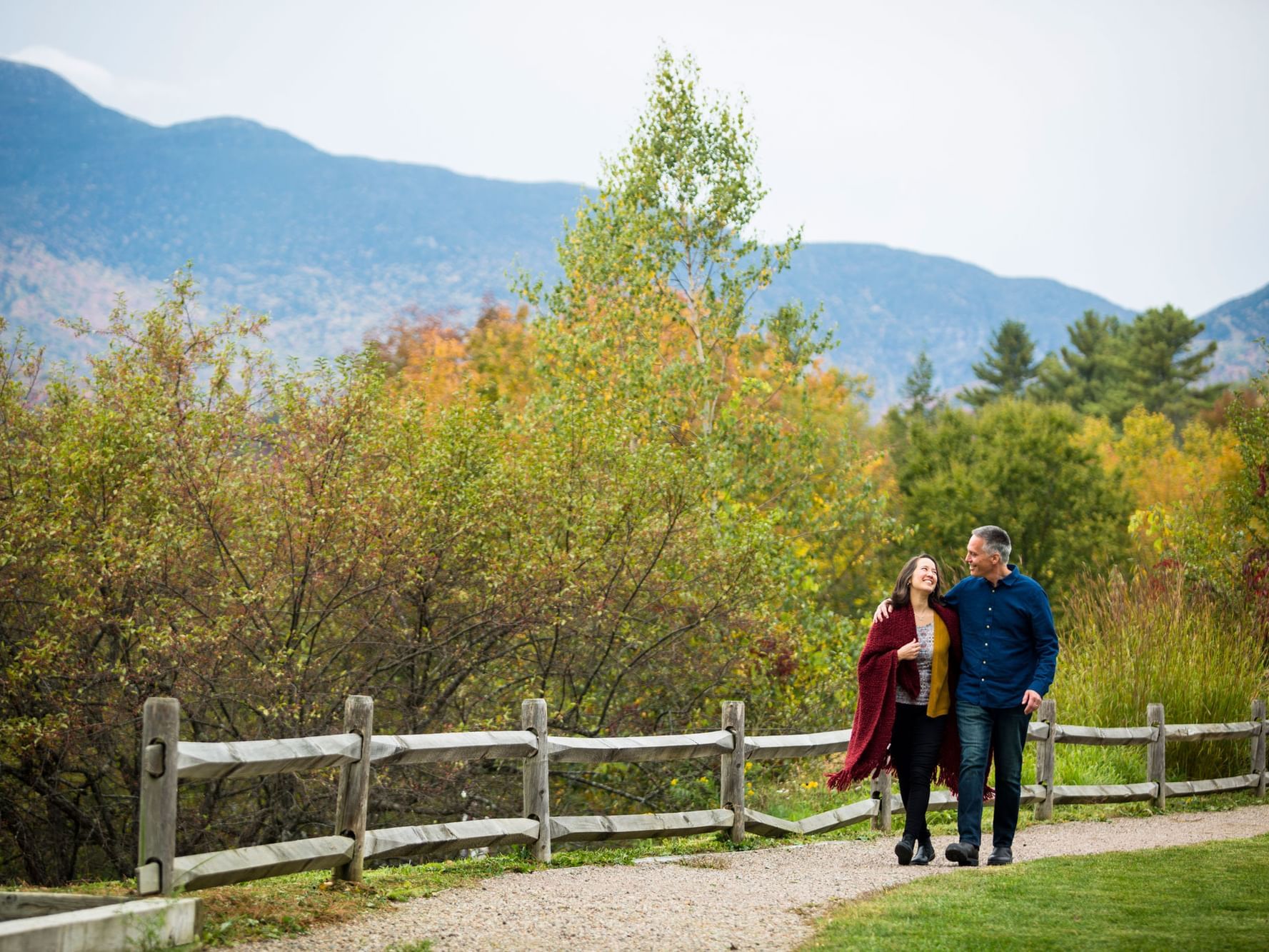A couple walking outside near Topnotch Stowe Resort