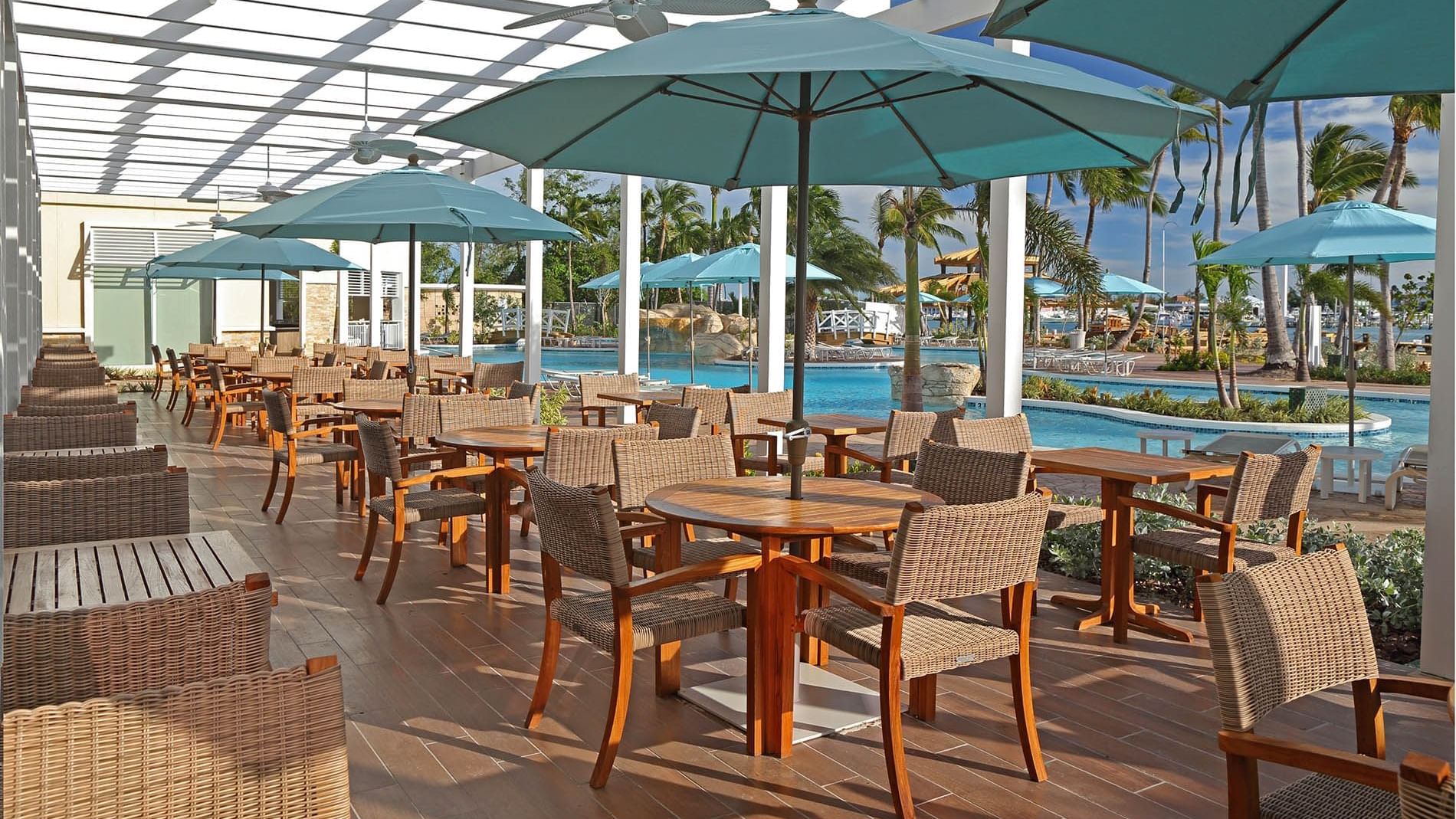 Dining tables set-up on a Terrace in Verandah Restaurant at Warwick Paradise Island Bahamas