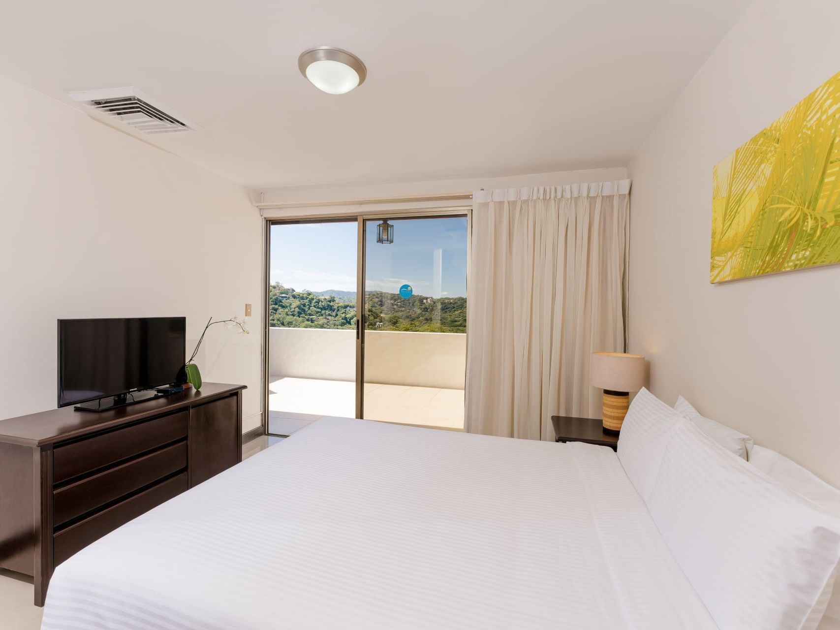 Bed in Estrella Junior Suite Villa at Villas Sol Beach Resort