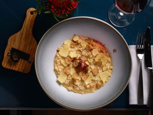 Close-up of a Aquerello Risotto dish served in the restaurant at The Capital Hotel London
