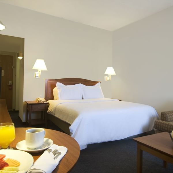 Fruit plate served with drinks in Superior Room at Fiesta Inn