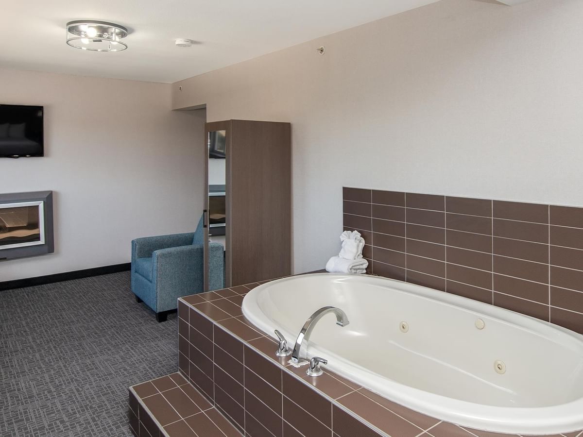 Jetted tub in a hotel suite.