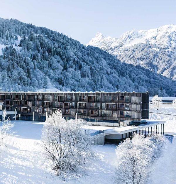Distant exterior view of Falkensteiner Hotel Montafon in Winter