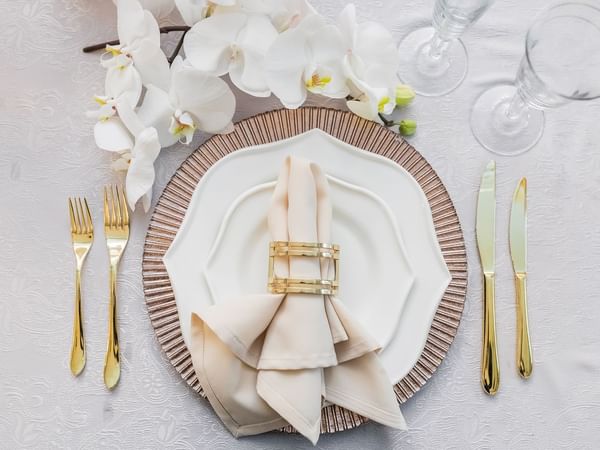 Close-up of a wedding table setting at Warwick Melrose