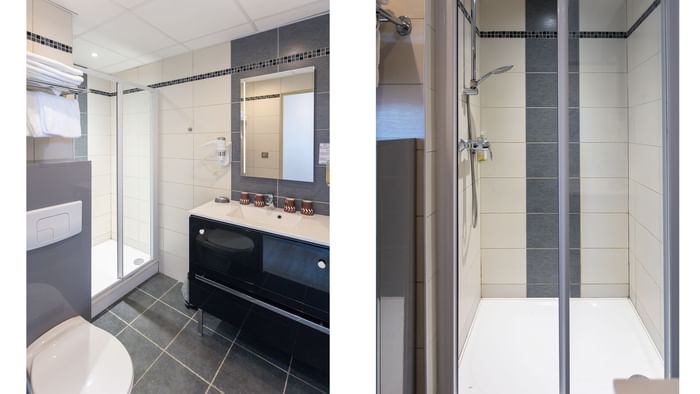 Shower & vanity in a bathroom in a room at Originals Hotels