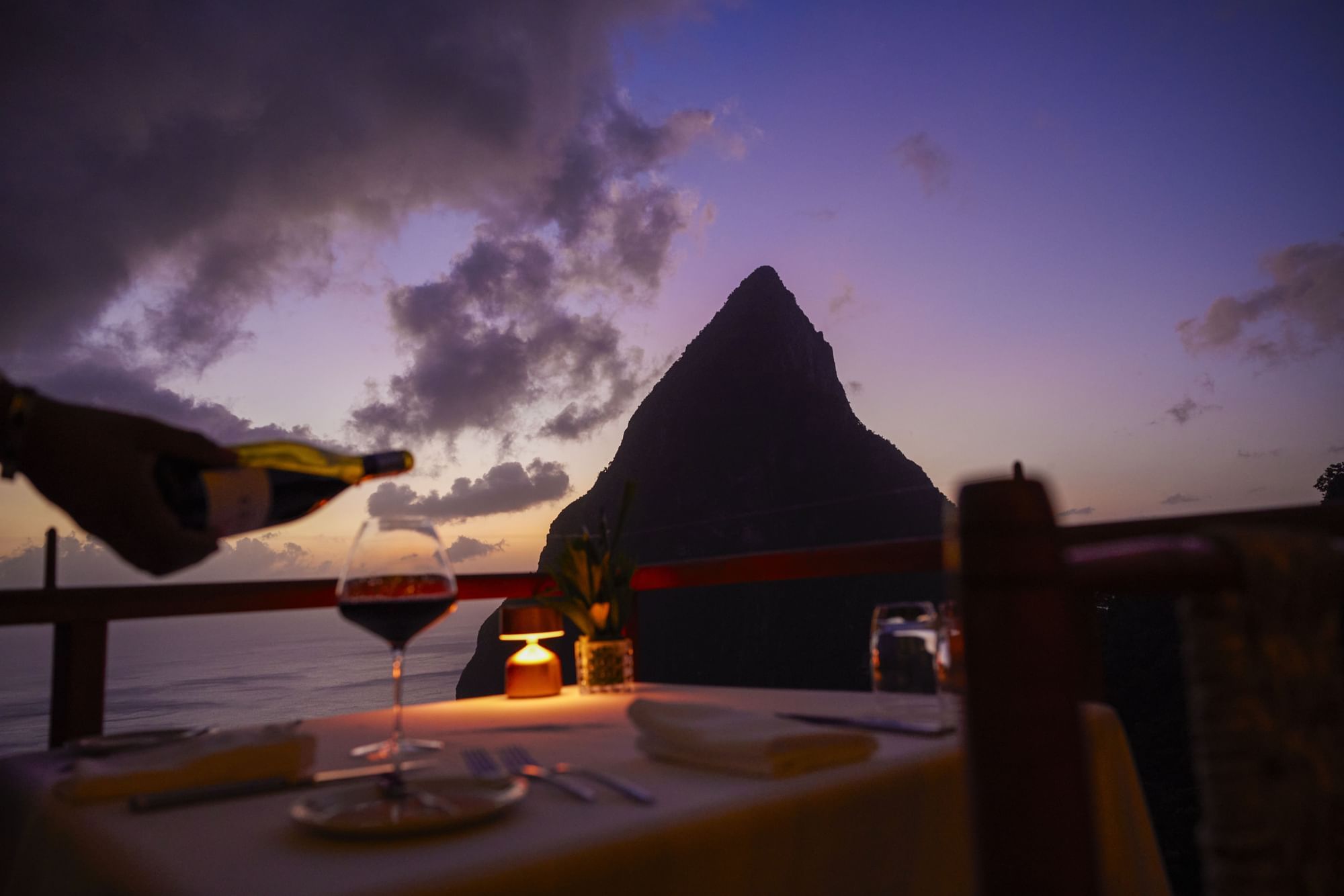 Wine glass served on table outdoors in Dasheene Restaurant at Ladera Resort