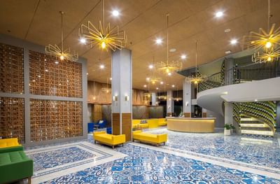 Elegant lobby area with reception at Eastin Ashta Resort Canggu