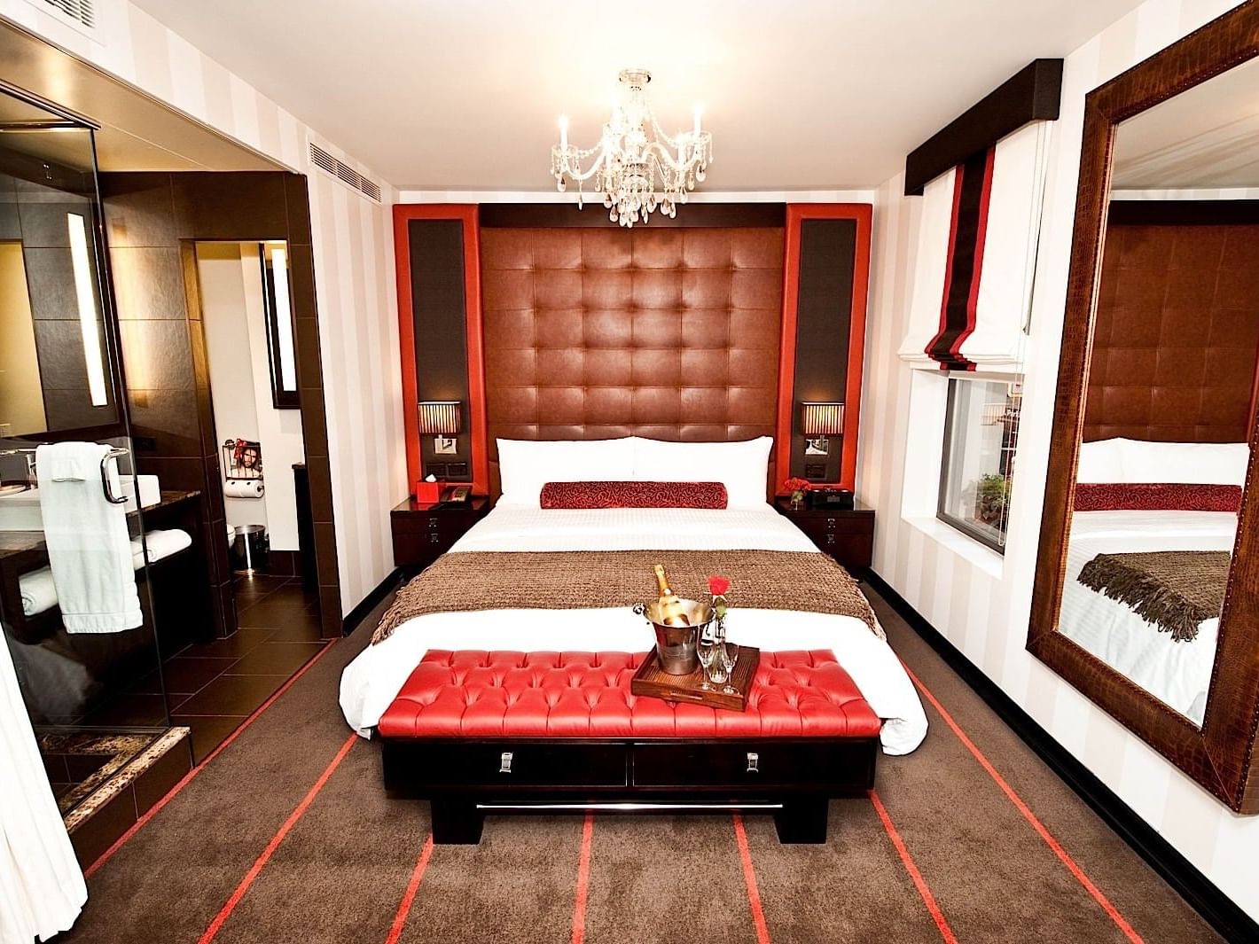 Deluxe King Room with large mirror at Sanctuary Hotel New York