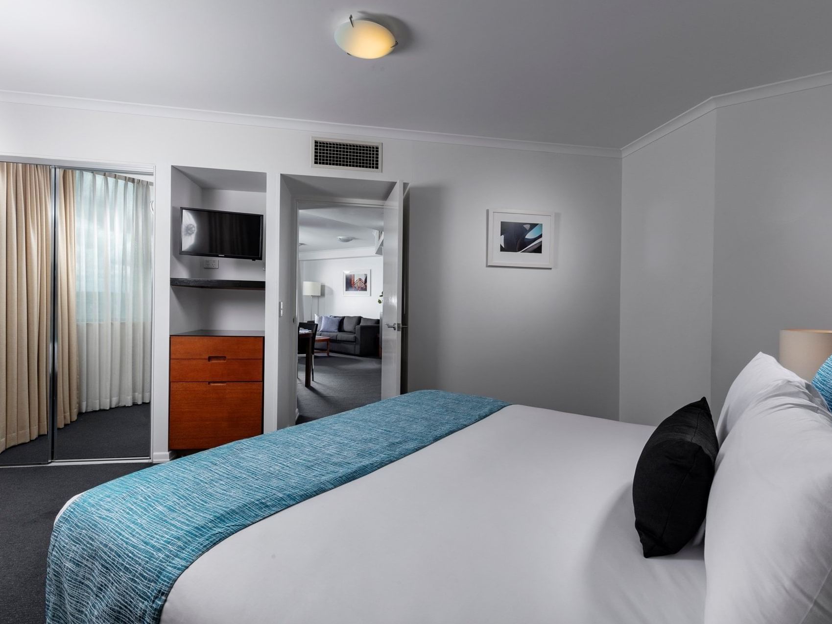 Comfortable bed room at Sebel Suites Brisbane