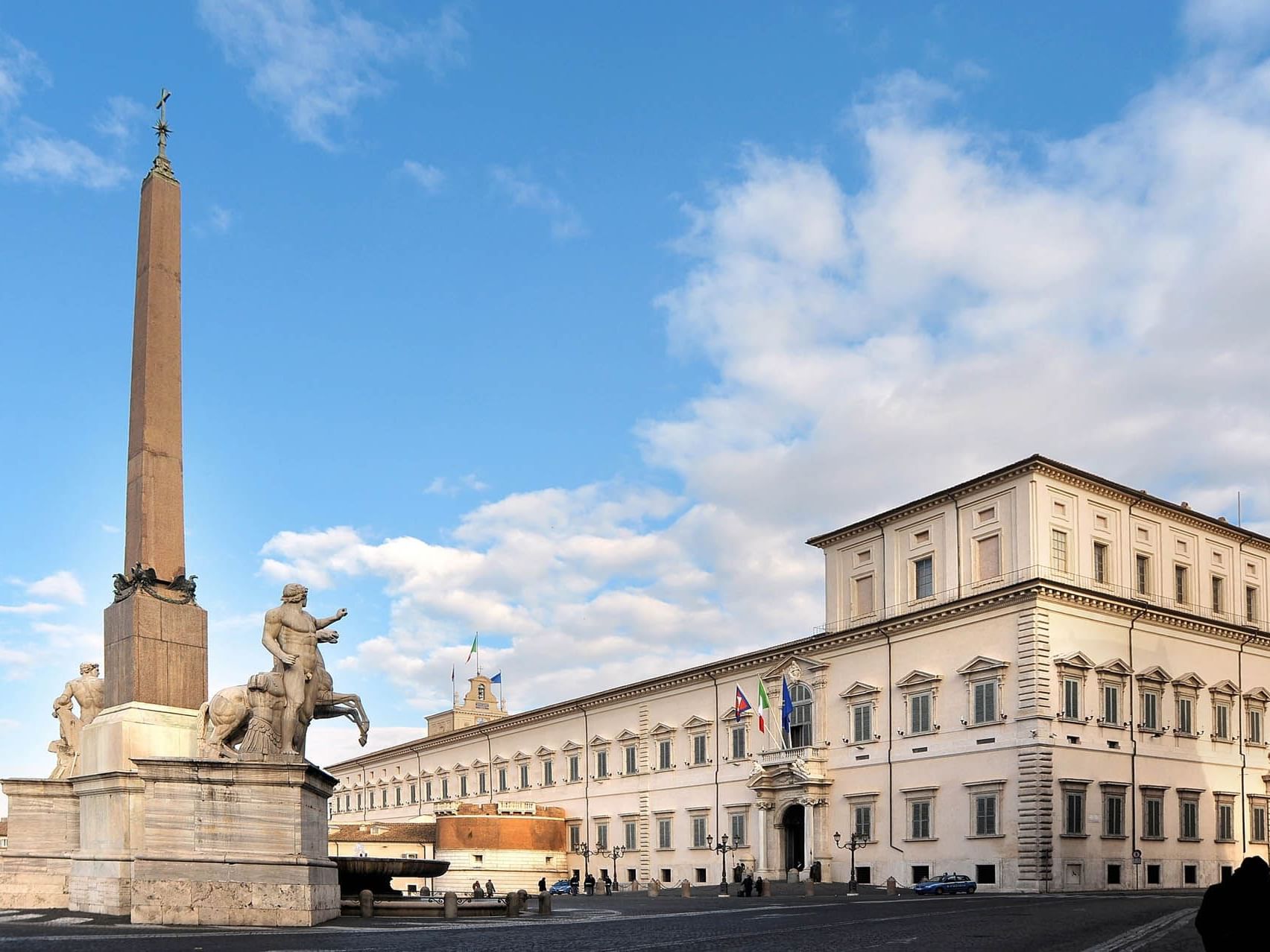 Exterior view of the Piazza del Quirinale on a sunny day near The Guardian Hotel