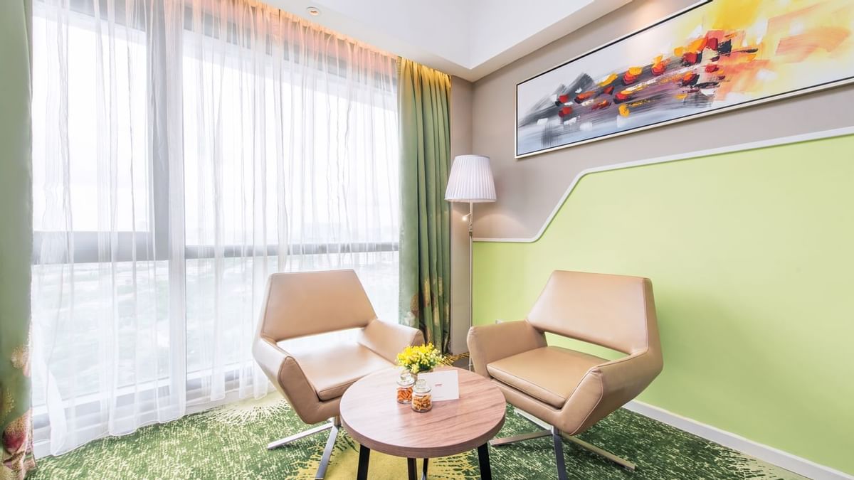 Bathroom vanity, shower area, and toilet in Junior Suite at Sunway Velocity Hotel