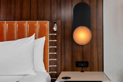 Close-up of bedside lamp & table in 1 King Bed at Godfrey Hotel Detroit