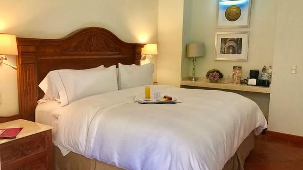King bed in Governor Suite at FA Hotels & Resorts