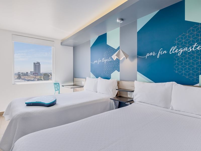 Dos camas individuales en Habitación Superior de One Hotels