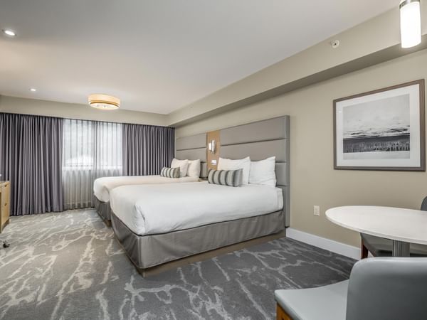 View of two queen beds in our Coast Accessible Two Queens Bedroom